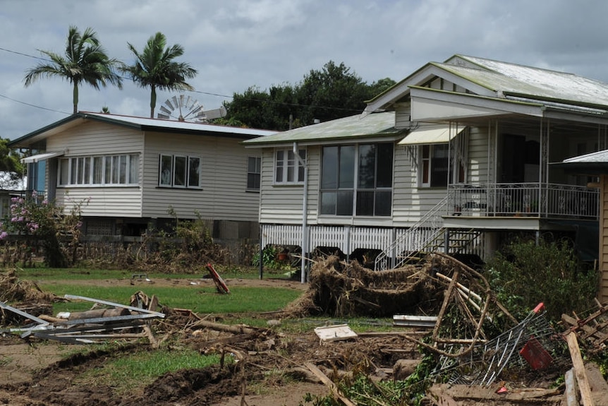 Defence Force helicopters fly over the devastated township of Grantham