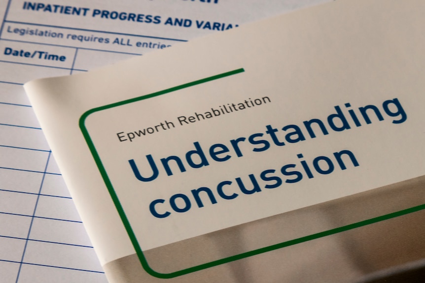 A close-up of a pamphlet about understanding concussion.