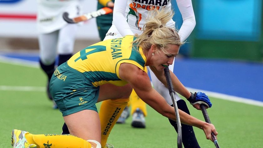 Hockeyroo Casey Eastham looks to pass against India at the World Cup