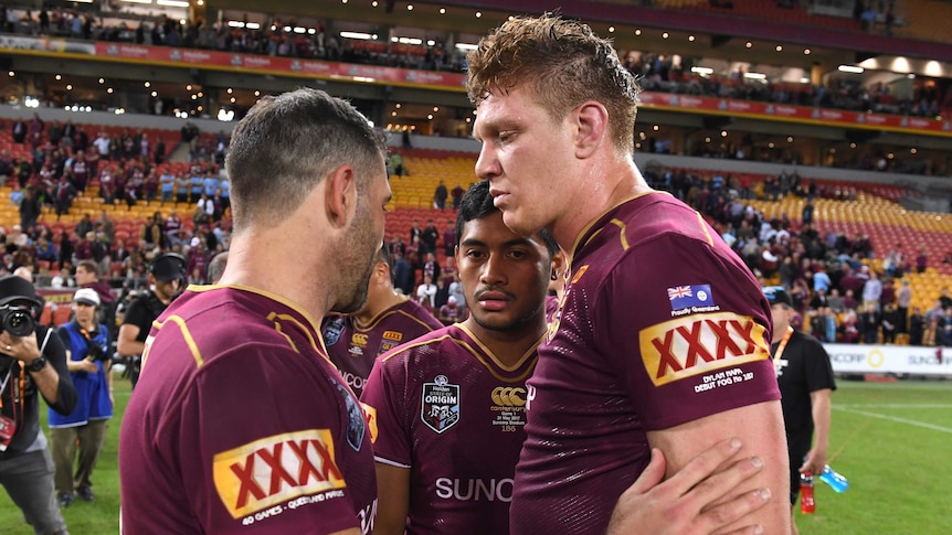 Cameron Smith consoles Dylan Napa and Anthony Milford