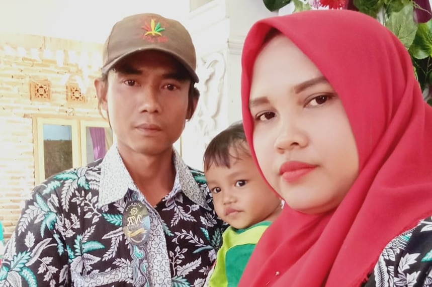 Rasminah, her husband and son.