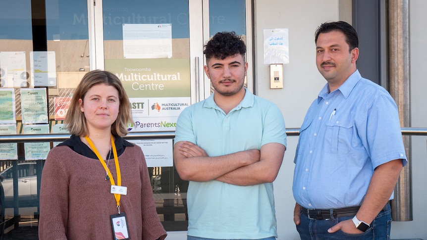 A woman and two men outside the Multicultural Australia office in Toowoomba, July 2020.