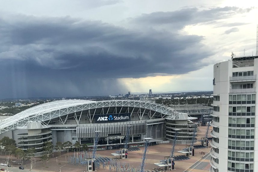 Storm clouds over ANZ Stadium at Sydney Olympic Park.