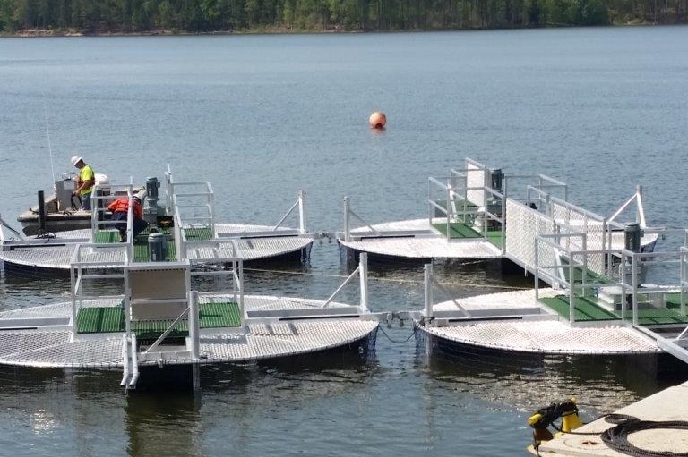 Four turbines used to create water currents floating in a lake in the United States