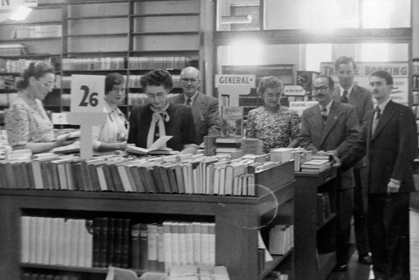 People inside Fullers Bookshop, Hobart, undated photo