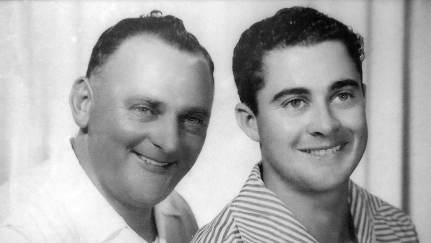 Black and white portrait shot of two men.