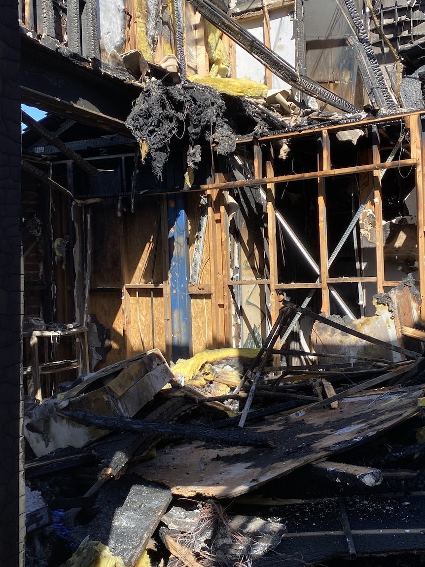 The burnt out interior of a house.