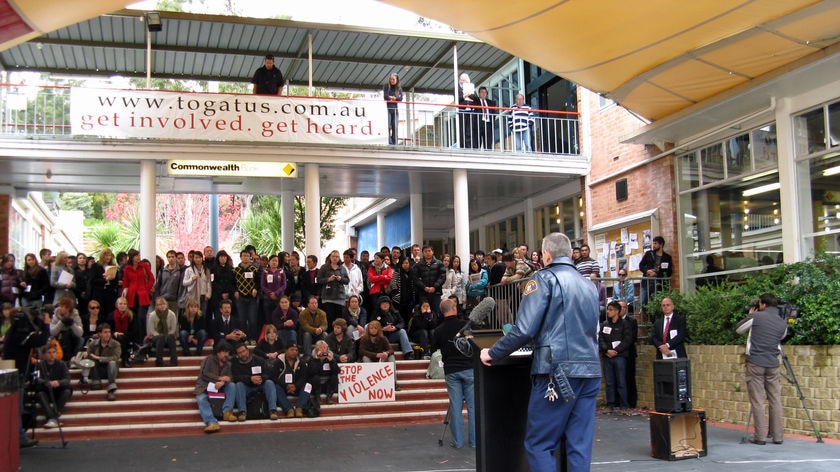 Tasmanian university students rally in Hobart over student violence.