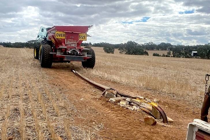 A farm vehicle after hitting an electricity pole on a property in South Australia.