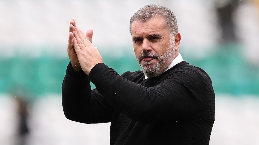 Ange Postecoglou claps his hands