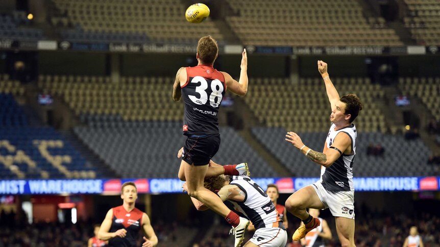 Melbourne's Jeremy Howe (#38) flies for a mark against GWS at Docklands.