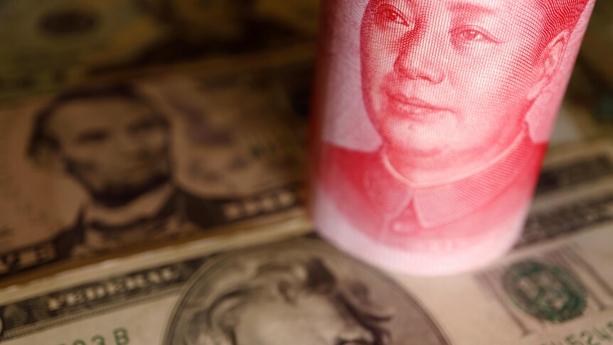 U.S. Dollar and Chinese Yuan banknotes