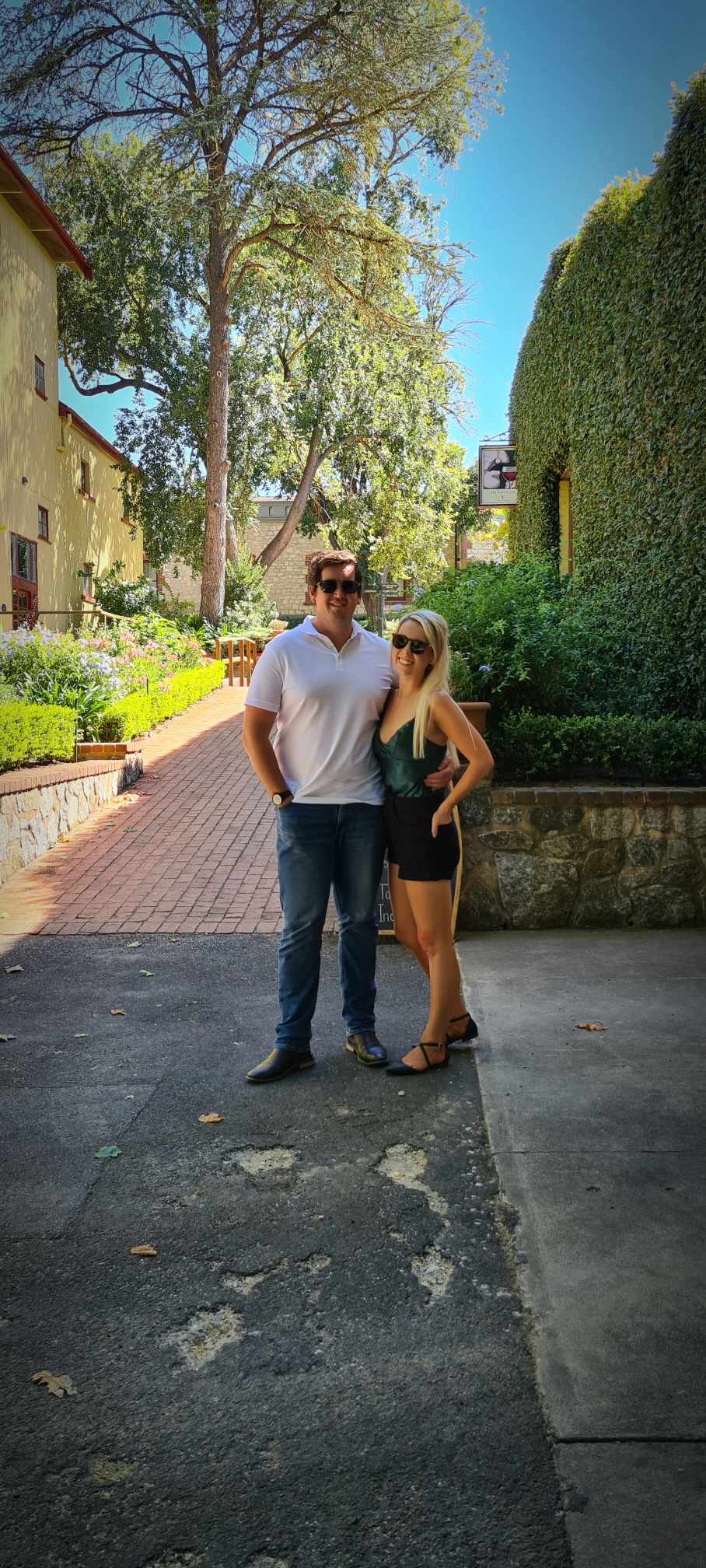 A couple in a garden.