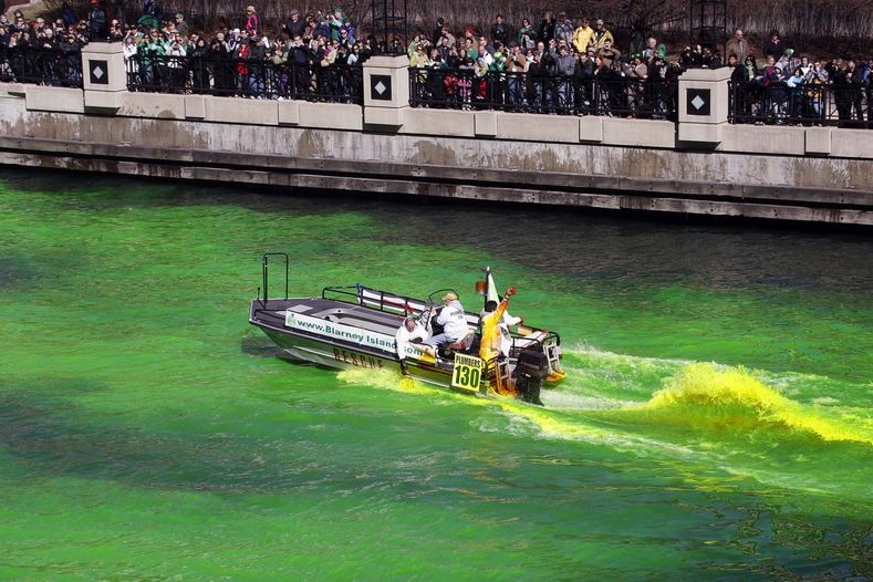 Journeymen Plumbers dye the Chicago River green to celebrate the start of St Patrick's Day