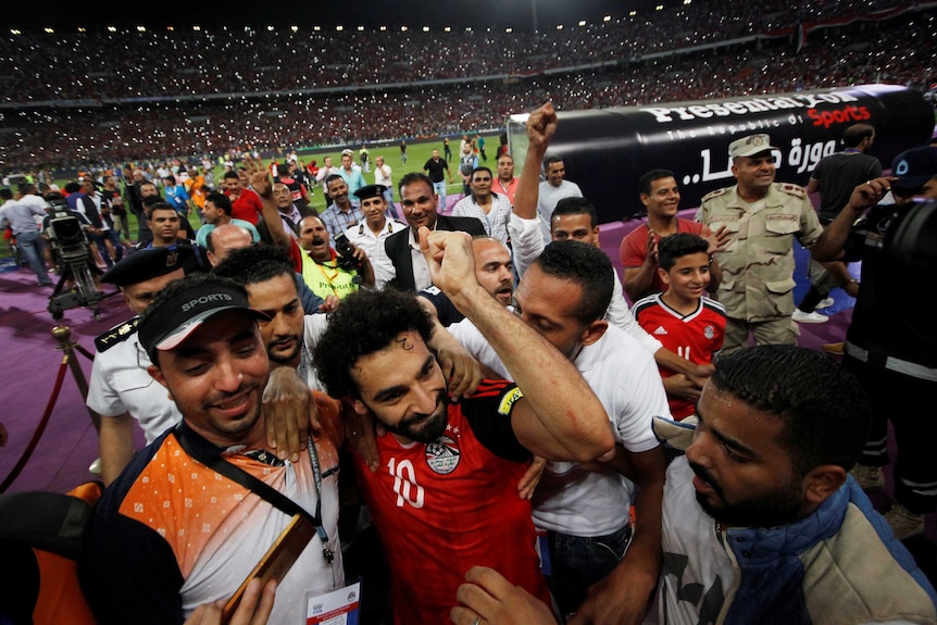 Egypt’s Mohamed Salah and team mates celebrate World Cup qualification with a win over Congo.