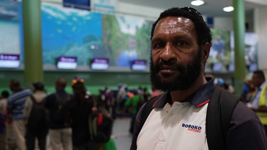 PNG mine worker Tami Kunjil, whose seven-year contract was terminated after just months