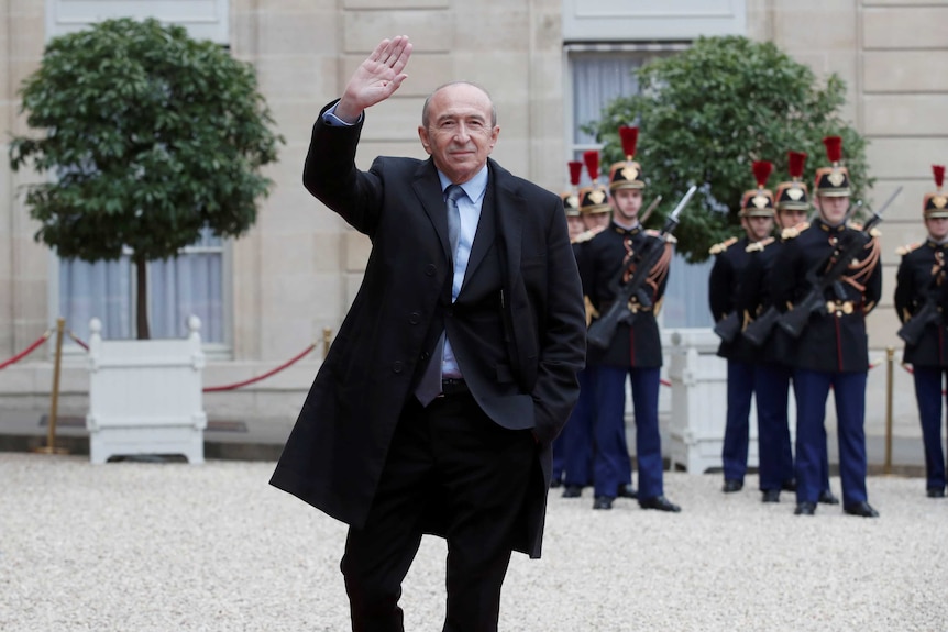 Mayor of Lyon Gerard Collomb arrives to attend a handover ceremony.