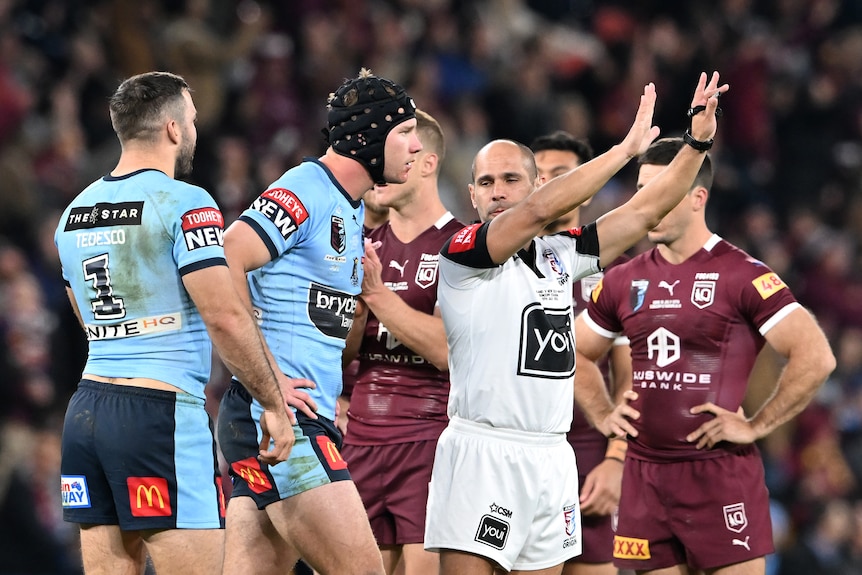 A male NSW Blues player is sent to the sin-bin by the referee in State of Origin III.