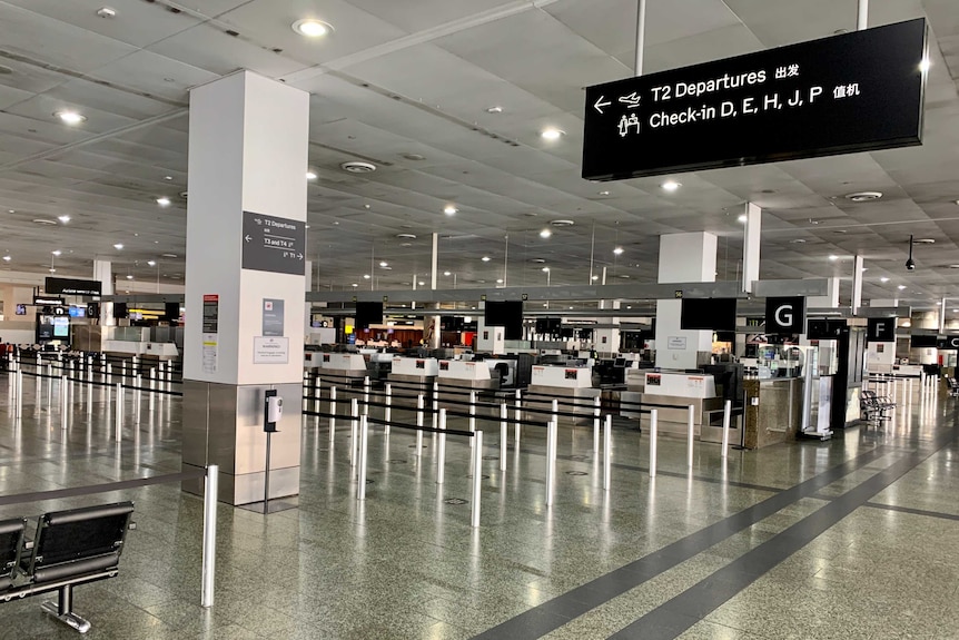 An empty departure hall in Melbourne airport.