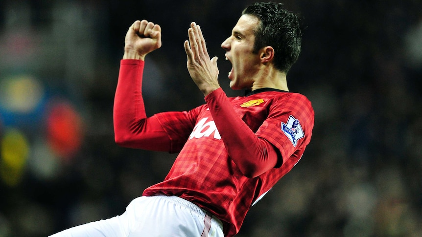 Robin Van Persie celebrates after scoring the fourth goal in Man United's 4-3 win over Reading.