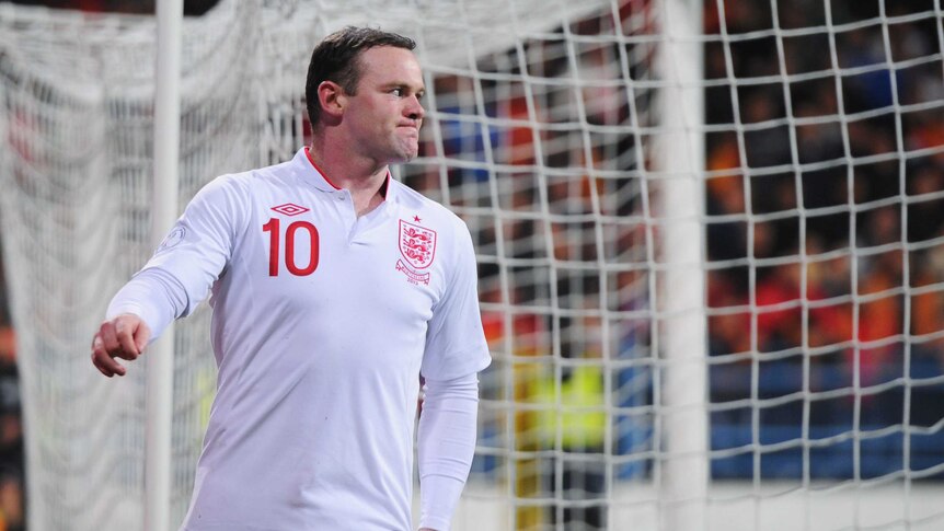 Rooney reacts during the FIFA 2014 World Cup Qualifier match between England and Montenegro