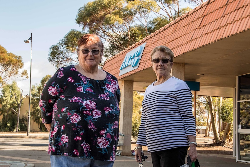 Women standing in front of Kambalda bank