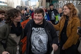 Colette Harmsen with supporters outside Hobart court.