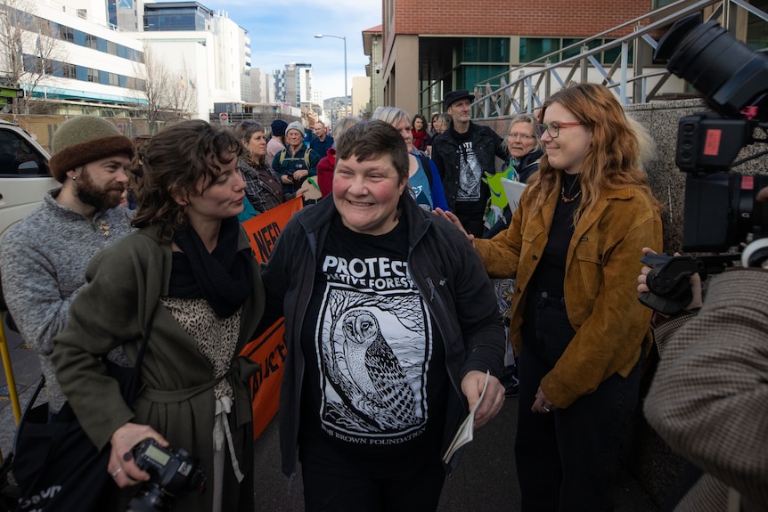 Colette Harmsen with supporters outside Hobart court.