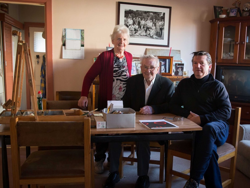 John Kelly with his mother and father