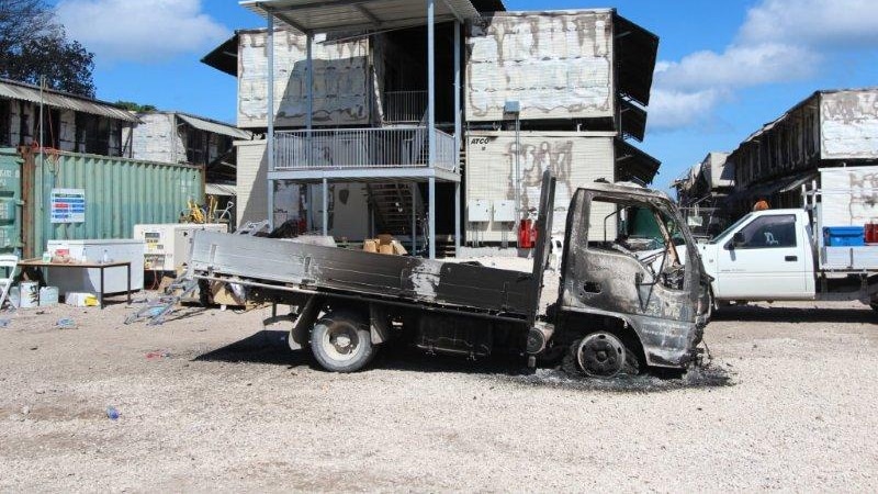Burnt-out truck after riot at Nauru detention centre