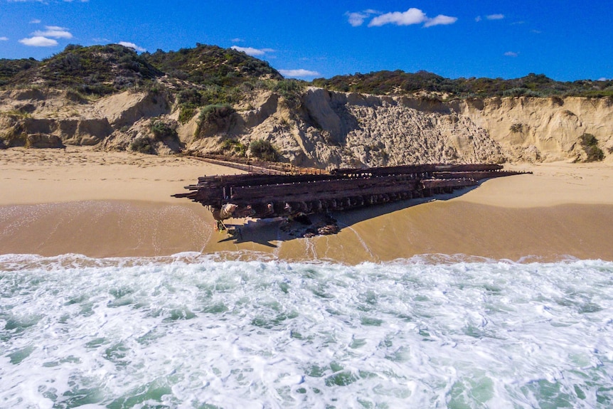 Shipwreck washed up on beach