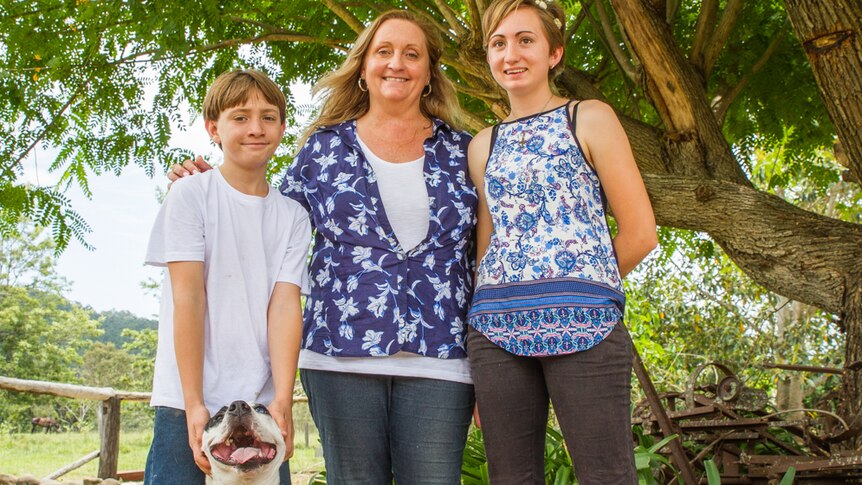 Jonah, LJ and Alex Cameron at their farm on the Scenic Rim in south-east Queensland.