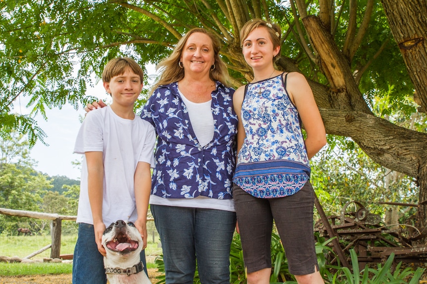 Jonah, LJ and Alex Cameron at their farm on the Scenic Rim in south-east Queensland.