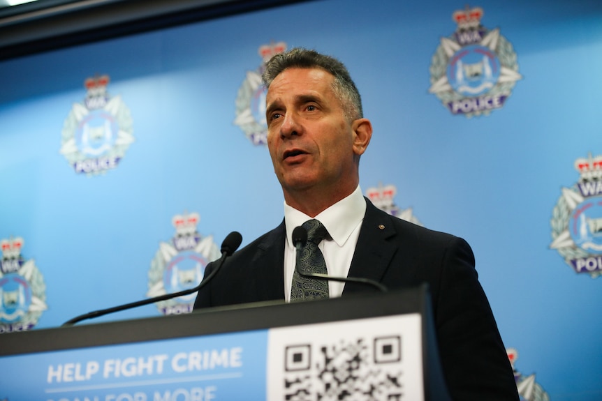 WA Police Minister Paul Papalia speaking from a podium.