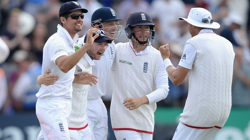 England's Alastair Cook and team-mates after win over Australia in first Ashes Test in Cardiff.