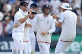 England's Alastair Cook and team-mates after win over Australia in first Ashes Test in Cardiff.