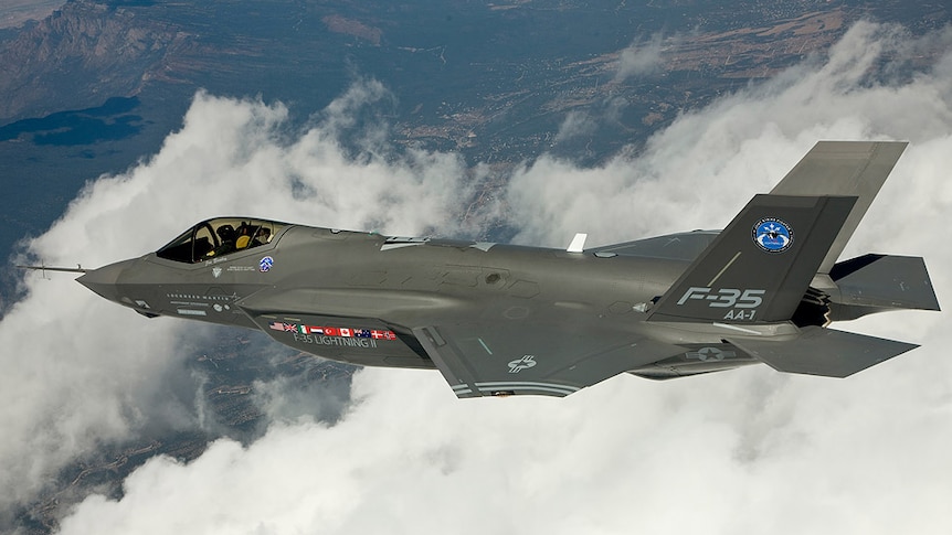 An F35 Joint Strike Fighter in flight in the clouds