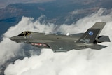 An F35 Joint Strike Fighter in flight in the clouds