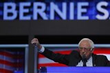 Former Democratic US presidential candidate Senator Bernie Sanders thrusts his fist