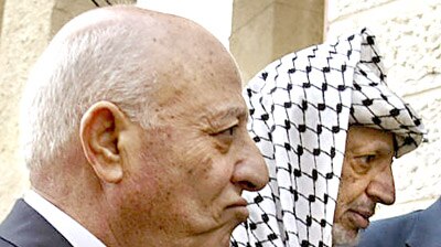 Palestinian Prime Minister Ahmed Qurie and President Yasser Arafat (File photo)