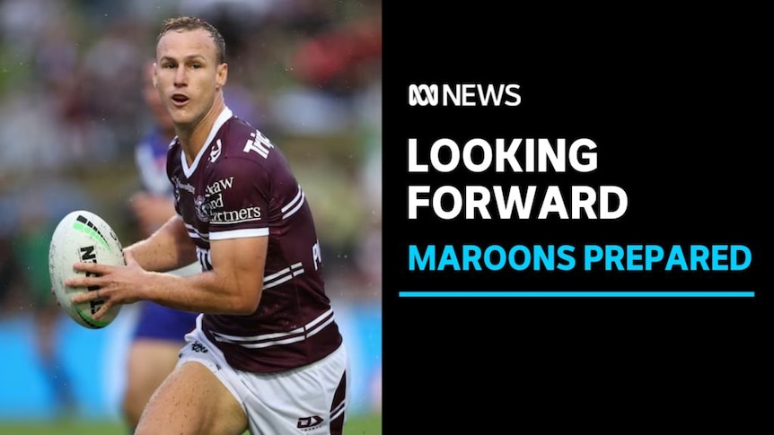 Looking Forward, Maroons Prepared: A man playing rugby league runs with the ball in both hands.