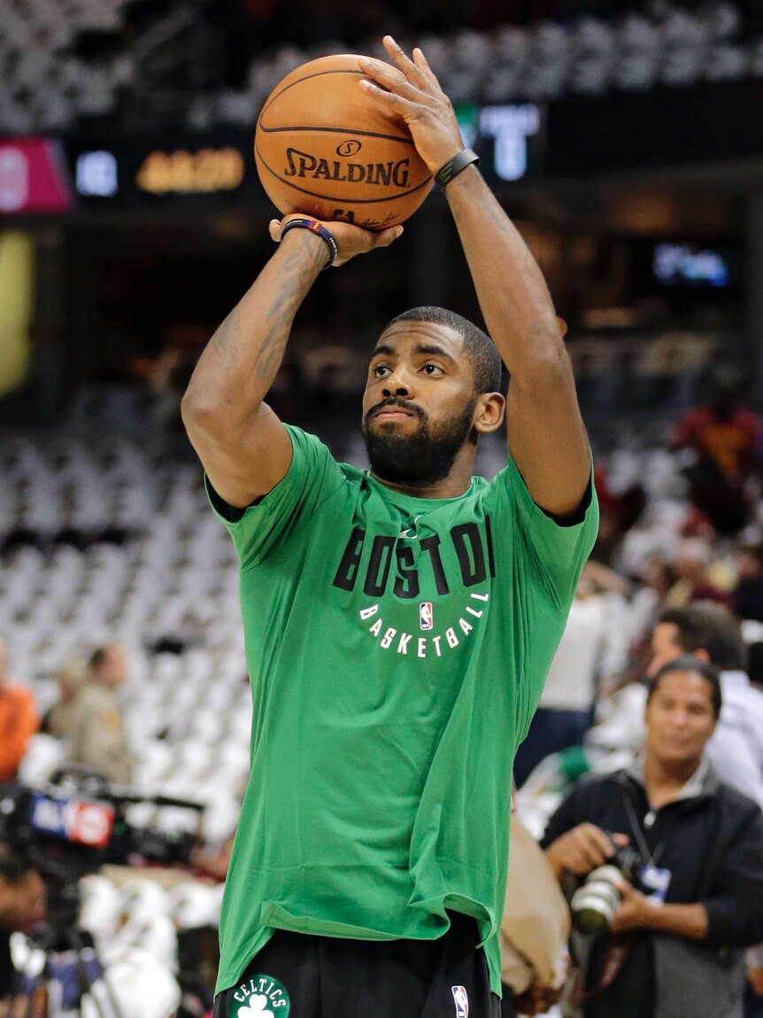 Kyrie Irving warms up for Boston Celtics