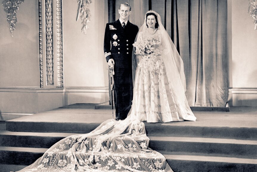 Queen Elizabeth II and Prince Philip pose for a photo after their wedding.
