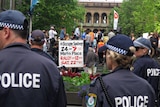 Police stand on guard during a Occupy protest at Martin Place in Sydney