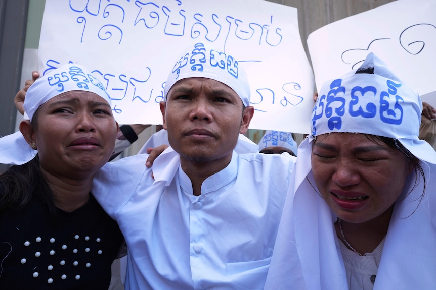 Cambodian activists wearing white clothes. 