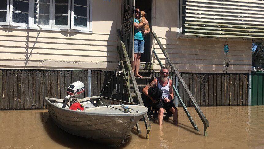 Depot Hill resident Mark Ford and his family were still surrounded by water on Saturday, despite the Fitzroy River receding.