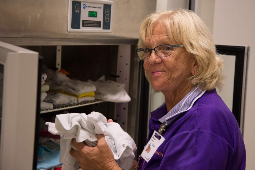 Betty Esmonde smiles as she takes a moment to think about the babies and families she helps in the unit.