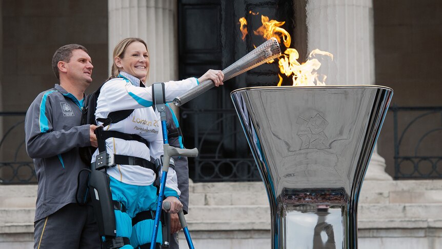 British athlete Claire Lomas lights the Paralympic Cauldron