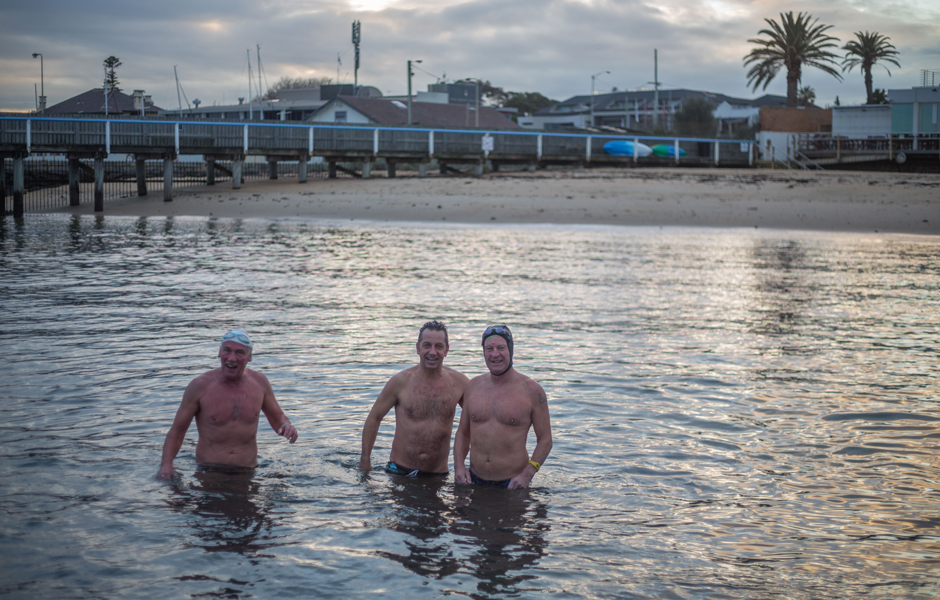 Icebergers come together for winter morning swim.