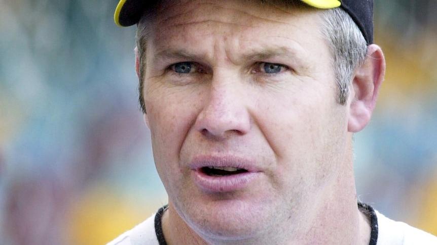 Danny Frawley wears a Richmond hat as he speaks to media in 2001.